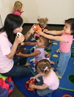 Miss Tracy teaching about animals in Mandarin